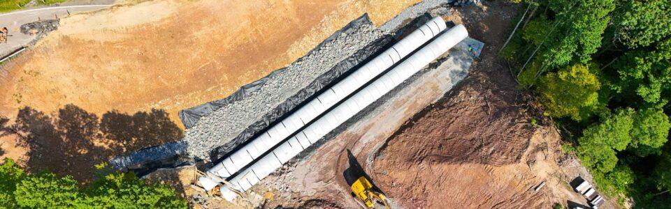 Aerial view of double run concrete pipe installation for Route 321 storm drain project